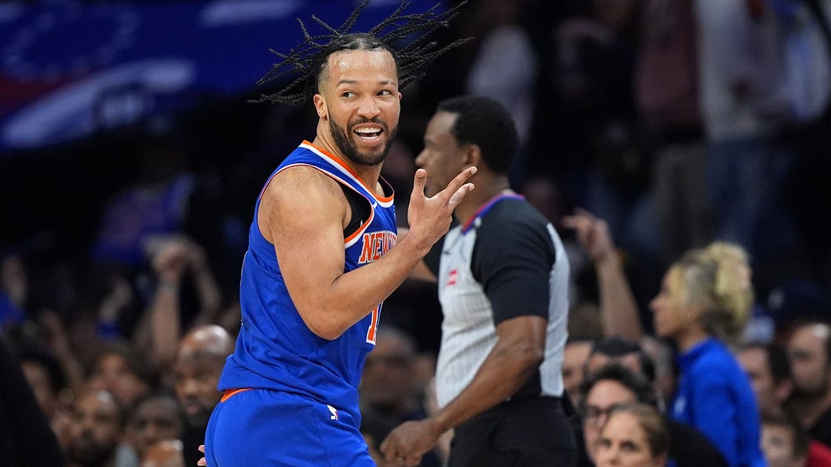 New York Knicks' Jalen Brunson reacting after scoring in a basketball game.