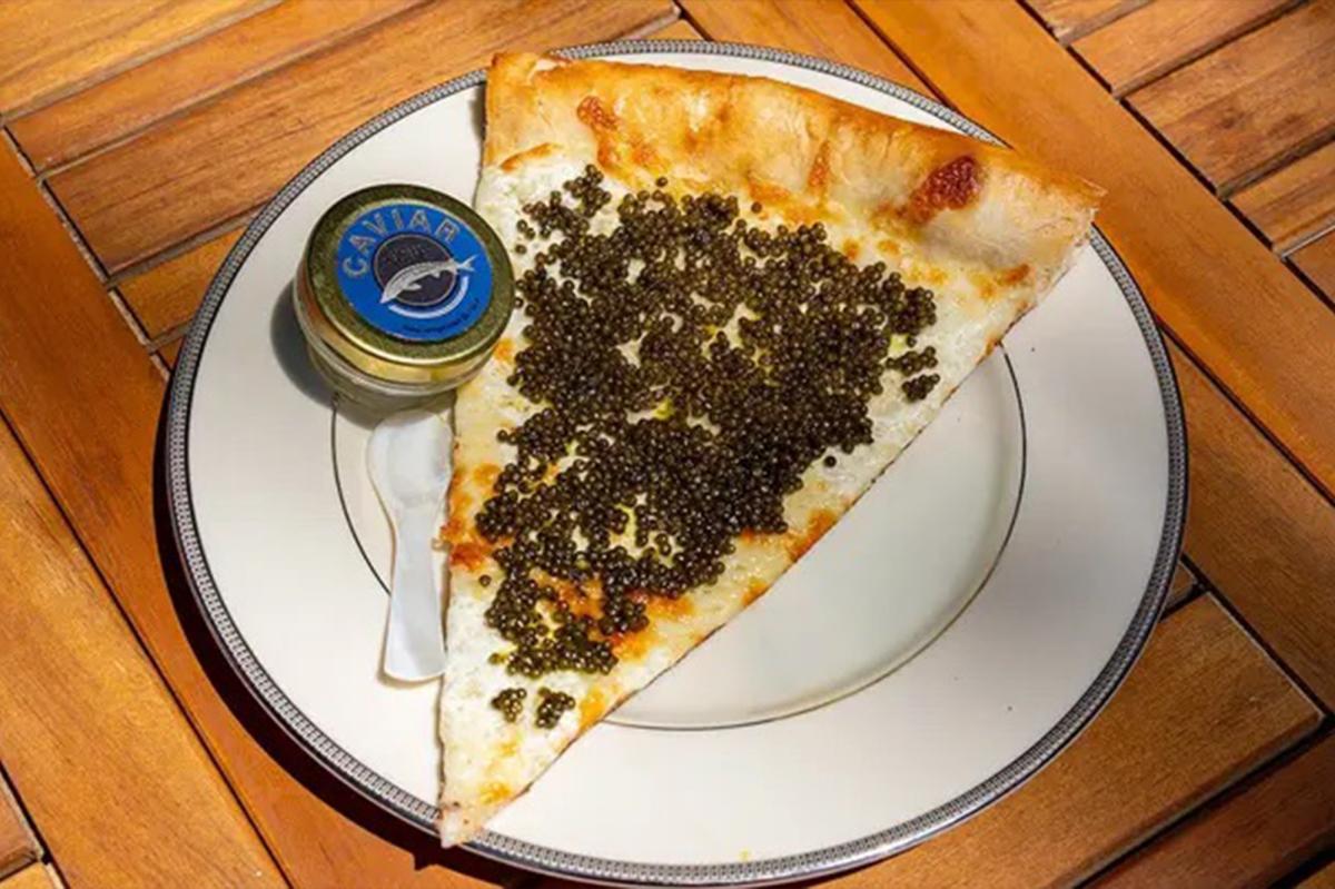 Philadelphia pizza shop sells $55 slices topped with caviar, served on gold plate