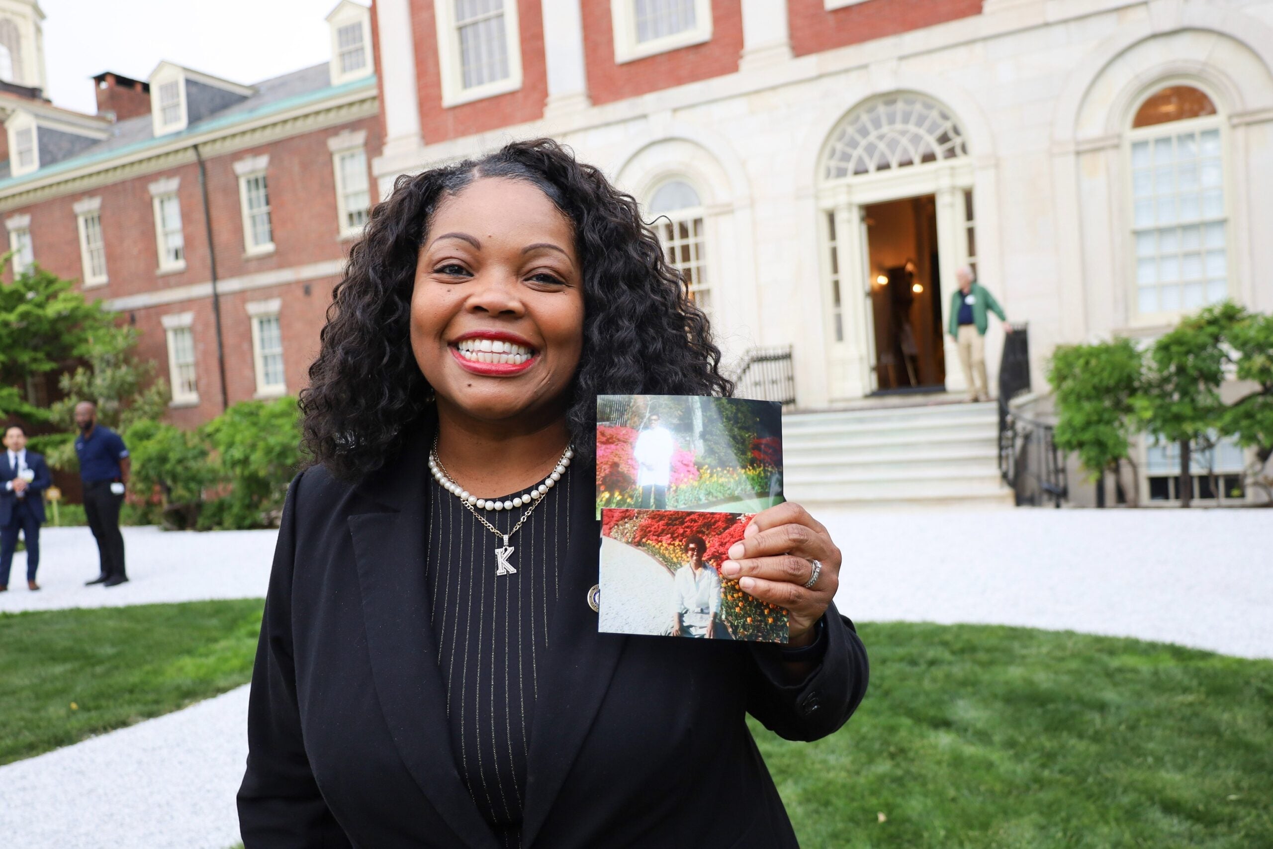 Katherine Gilmore Richardson holds photos of her parents