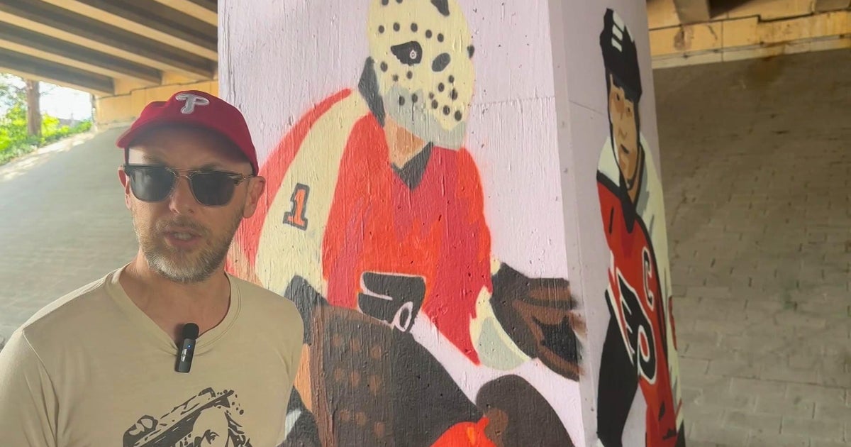 This Philadelphia street artist combines love of sports and art to create artwork under I-95