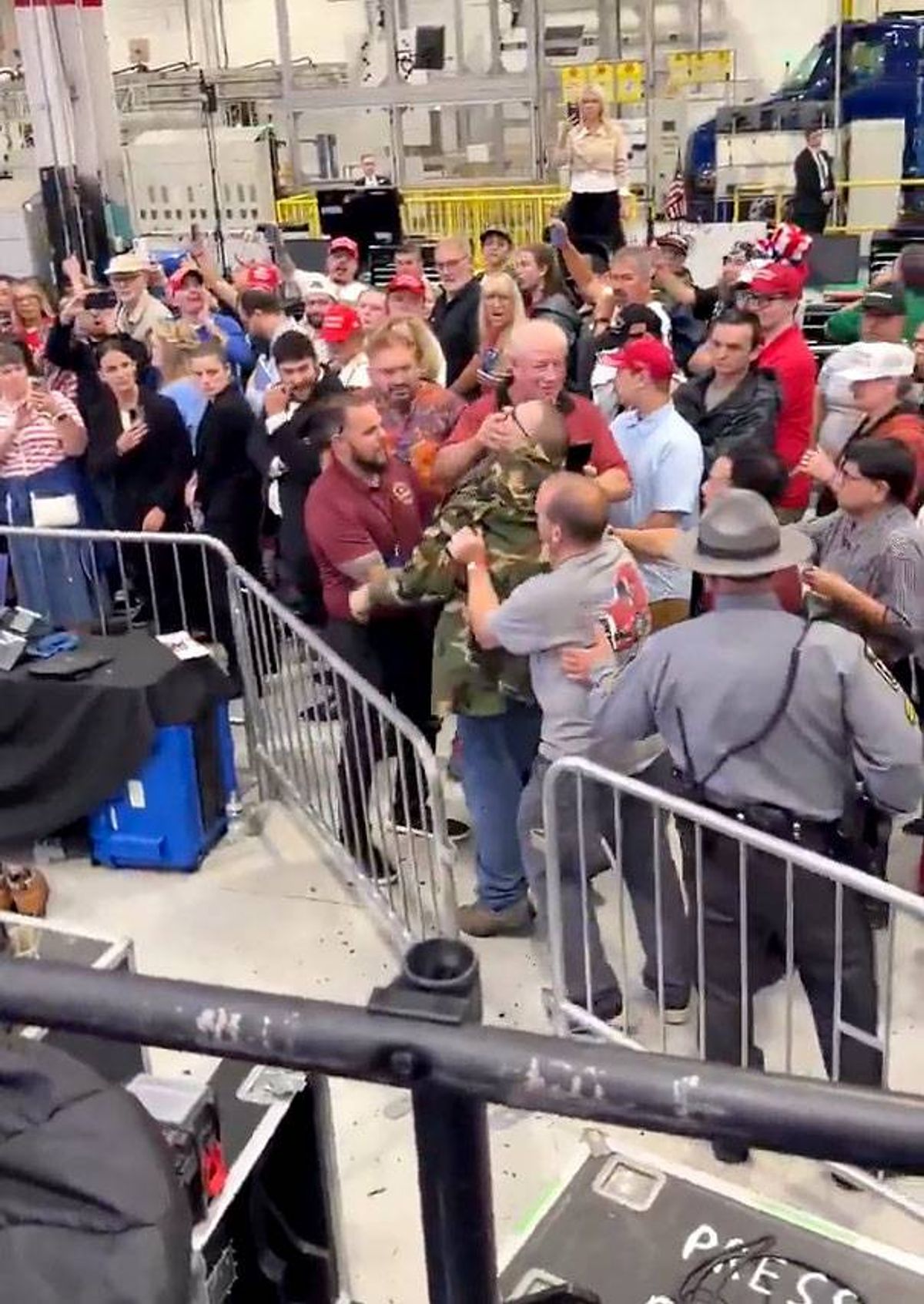 A protester who attended President Donald Trump's rally was removed from the gathering after he started shouting insults at the president, who seemed to ignore it