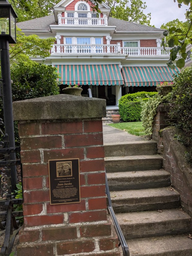 Jane Jacobs was born Jane Isabel Butzner on May 4, 1916, when her family lived on Electric Street in Scranton. When she was 5 they moved about a mile away to this house on Monroe Avenue in Dunmore. In April 2011 the Northeastern Pennsylvania Chapter of the American Institute of Architects unveiled a plaque honoring Jacobs at the front of the property, shown here in May 2026. (STAFF PHOTO)