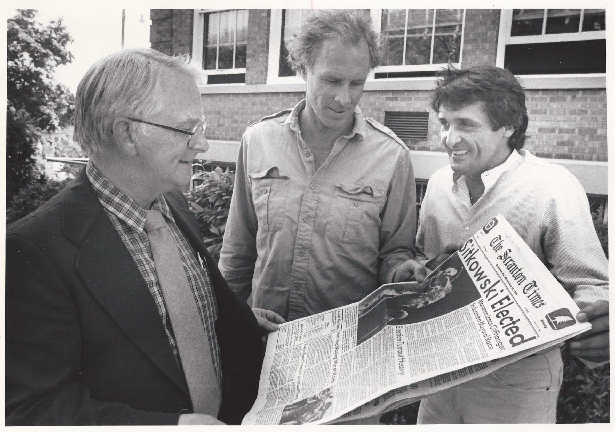 Ed E. Rogers, left, then-managing editor of The Scranton Times...
