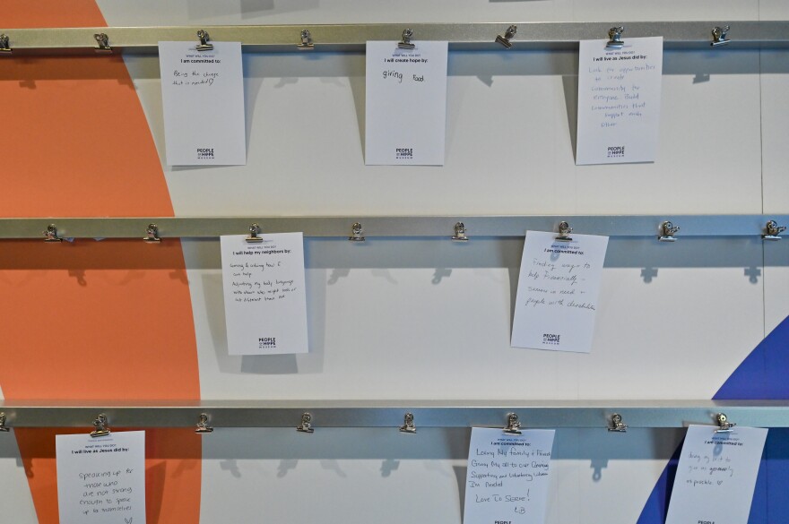 A reflection wall is the last exhibit in the People of Hope traveling museum. Those who tour the exhibits are asked share how they will respond to the needs that they see in their community.