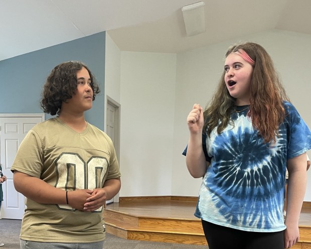 Jeremy Ortiz as Daniel fights with Makayla Matt as Andrea in the Reading Community Players youth musical 'Once on This Island JR' on June 26 and 27.  (Photo courtesy of Debbi Silas, Reading Community Players)