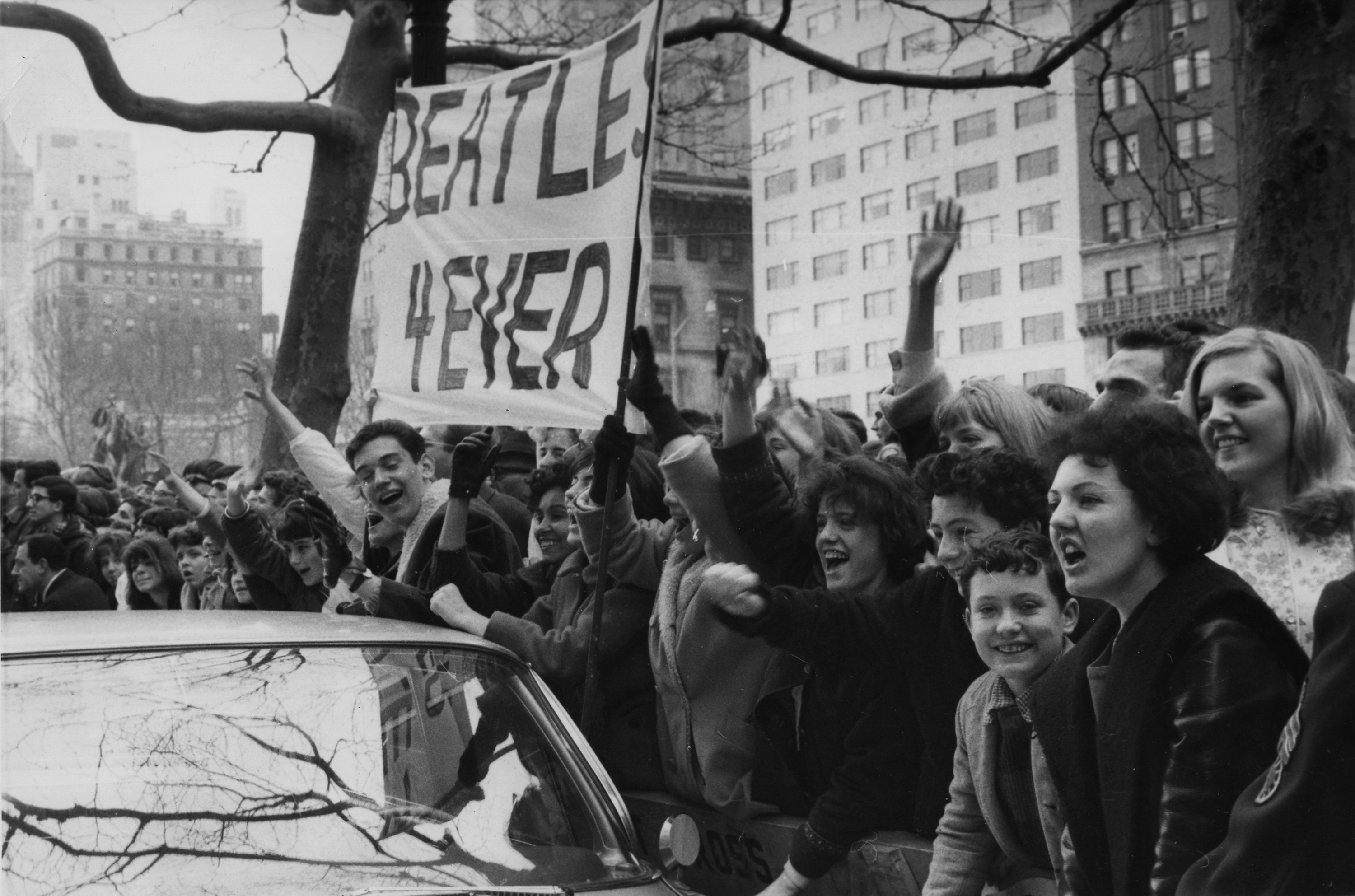 FILE – In this Feb. 7, 1964 file photo, screaming...