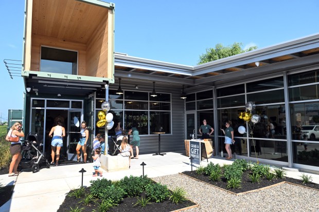 Customers at Twin Valley Coffee's grand opening 'homecoming weekend' celebration on Friday, June 12 (BILL UHRICH/MEDIANEWS GROUP)