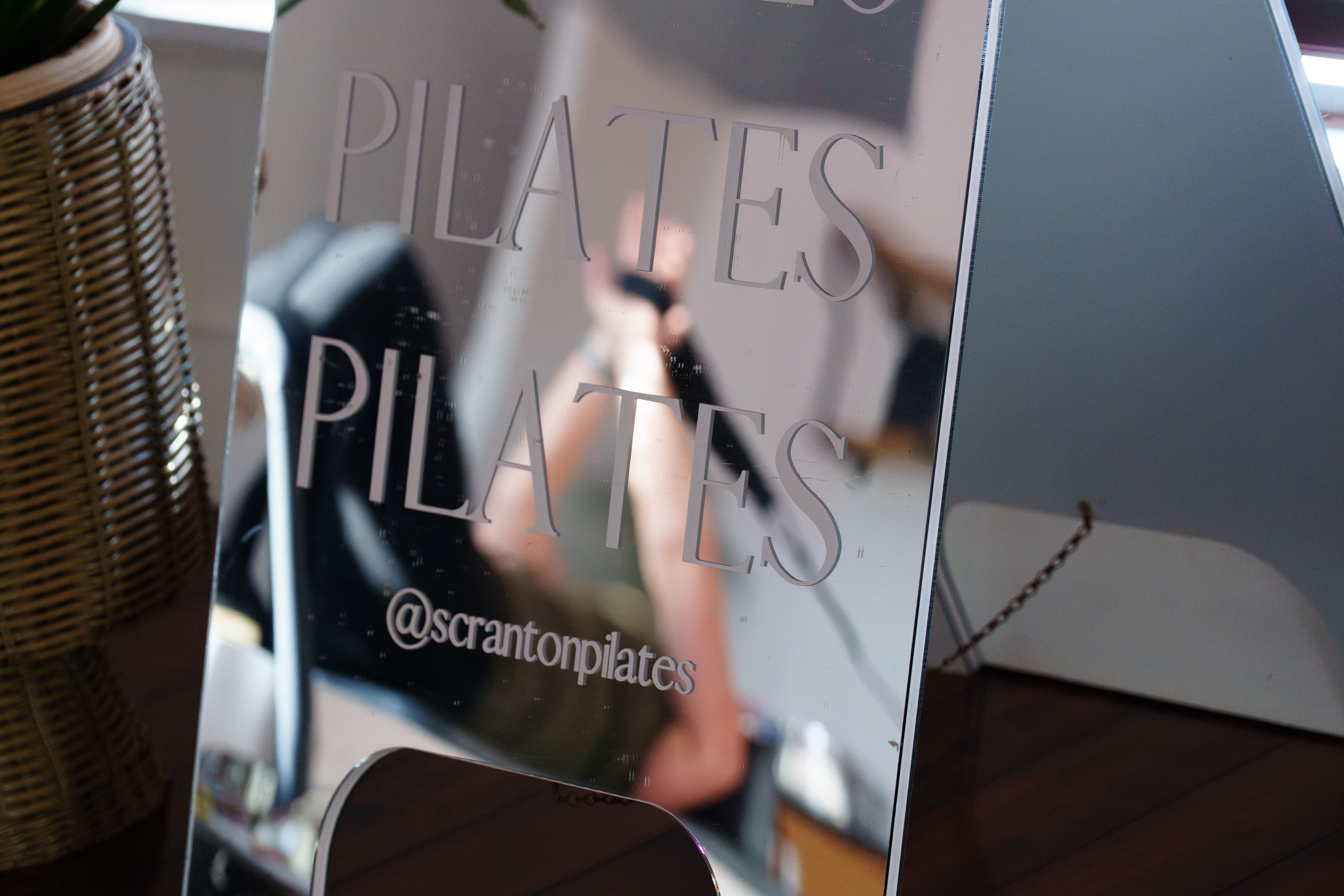 A participant is reflected in a sign during a group...