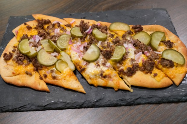 Cheeseburger flatbread was one of the dishes served for sampling at the launch celebration of the Pennsylvania Beef Trail on Friday, May 29, 2026 at Saucony Creek Brewing Co. in Kutztown. The council created an online resource that highlights and maps out nominated beef dishes at Pennsylvania restaurants. (Sharon Merkel/Special to The Morning Call)