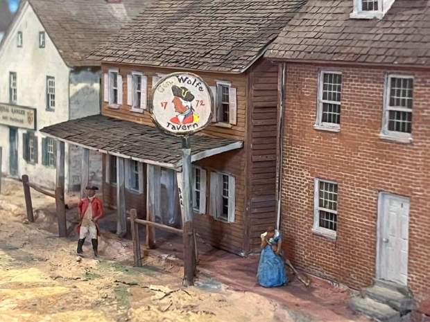 Innkeepers and shop owners often served as officers of Pennsylvania's local militias. Reading's Gen. Wolfe tavern, named in honor of a British hero of the French and Indian War, was renamed at the start of the Revolutionary War. The tavern, which was next to Conrad Weiser's White Store in the 500 block of Penn Street, is seen in miniature in this this model of Colonial Reading made by the Museum Extension Project, W.P.A., and dedicated to the Historical Society of Berks County, now Berks History Center, in 1941. (Courtesy of Floyd Turner, former president of the BHC)