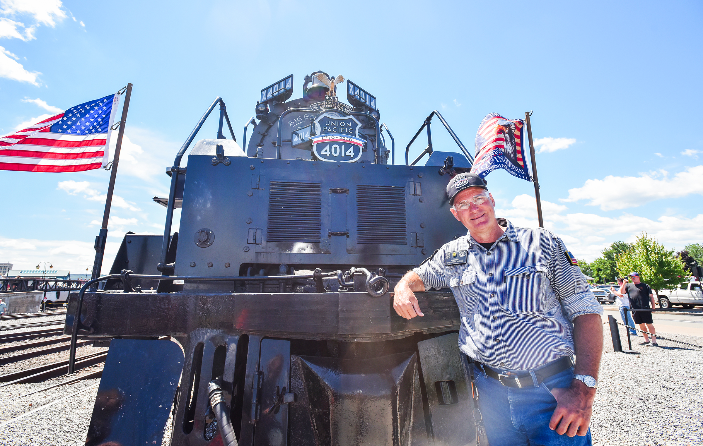 Union Pacific engineer Ed Dickens poses for a photograph with...