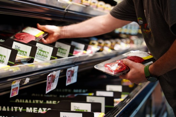 A shopper reaches for packages of meat at Gerrity's the Fresh Grocer in Scranton, Pa., on Friday, June 19, 2026. (ISAAC DIAZ/STAFF PHOTO)