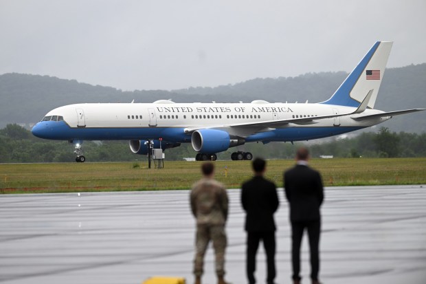 President Donald J. Trump arrives at Reading Regional Airport in Bern Township in the rain before proceeding to Mack Trucks in Lower Macungie Township, Lehigh County, on Tuesday, June 23, 2026.(BILL UHRICH/READING EAGLE)