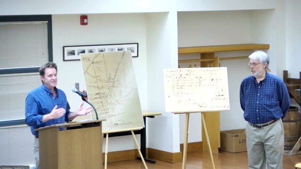 Local historians Victor Verbeke of Lower Salford, left, and Brian Hagey of Towamencin speak to the township supervisors while showing a map where George Washington and the Continental Army reportedly encamped in the township in Oct. 1777, during the township supervisors meeting on April 23, 2025. (Screenshot of meeting video)