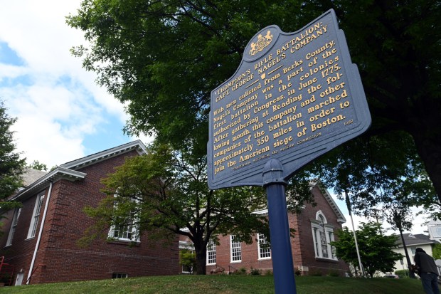 A Pennsylvania historical marker highlighting the Thompson's Rifle Battalion during the Revolutionary War is displayed outside the Berks History Center, 940 Centre Ave. (BILL UHRICH/READING EAGLE)