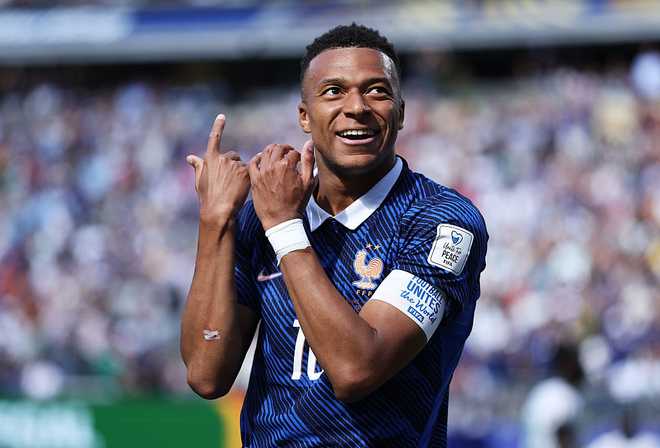 France v Senegal: Group I - FIFA World Cup 2026 EAST RUTHERFORD, NEW JERSEY - JUNE 16: Kylian Mbappe #10 of France celebrates scoring his team's first goal during the FIFA World Cup 2026 Group I match between France and Senegal at New York New Jersey Stadium on June 16, 2026 in East Rutherford, New Jersey. (Photo by Dan Mullan/Getty Images)