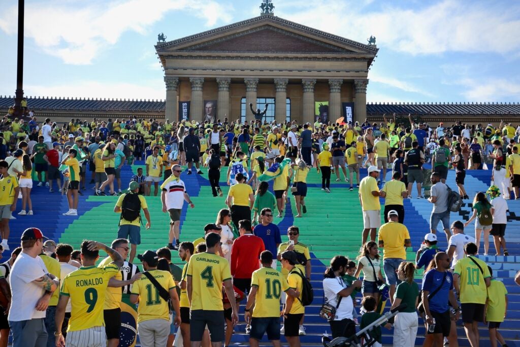 Brazilian fans rally on the steps of the Art Museum.