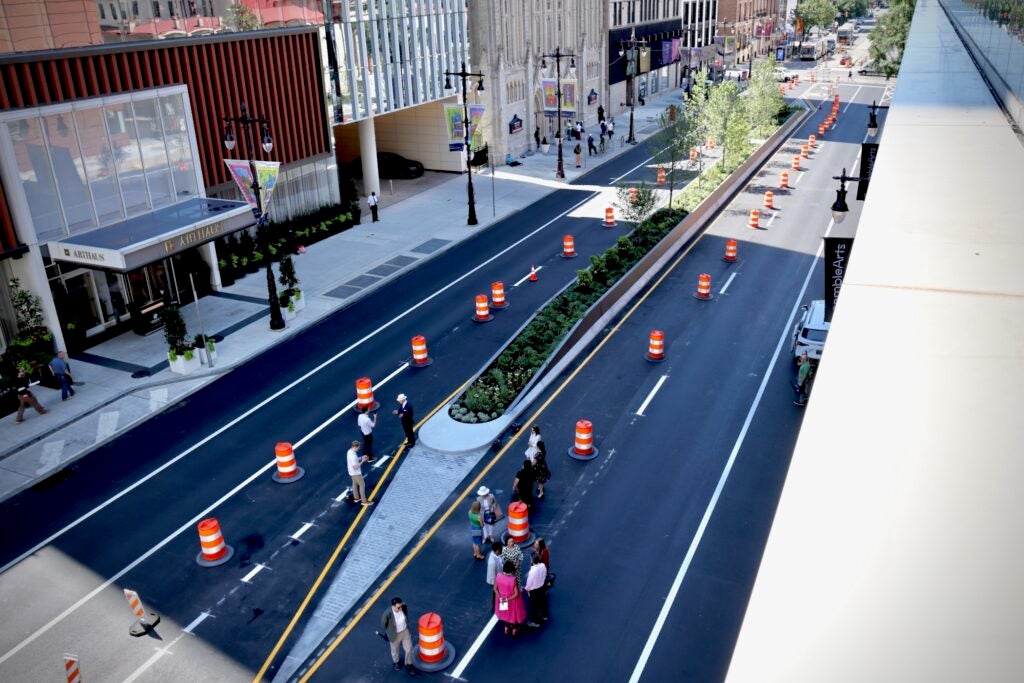 A block of South Broad Street in Philadelphia, between Spruce and Pine streets, is seen with a raised median filled with plantings