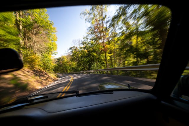 1983 Porsche 911SC driving road blur