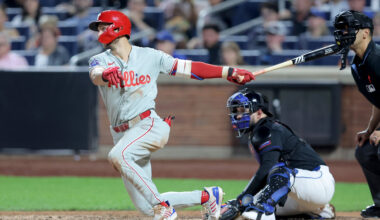 Philadelphia Phillies shortstop Trea Turner (7) follows through on an RBI single against the New York Mets during the seventh inning at Citi Field.