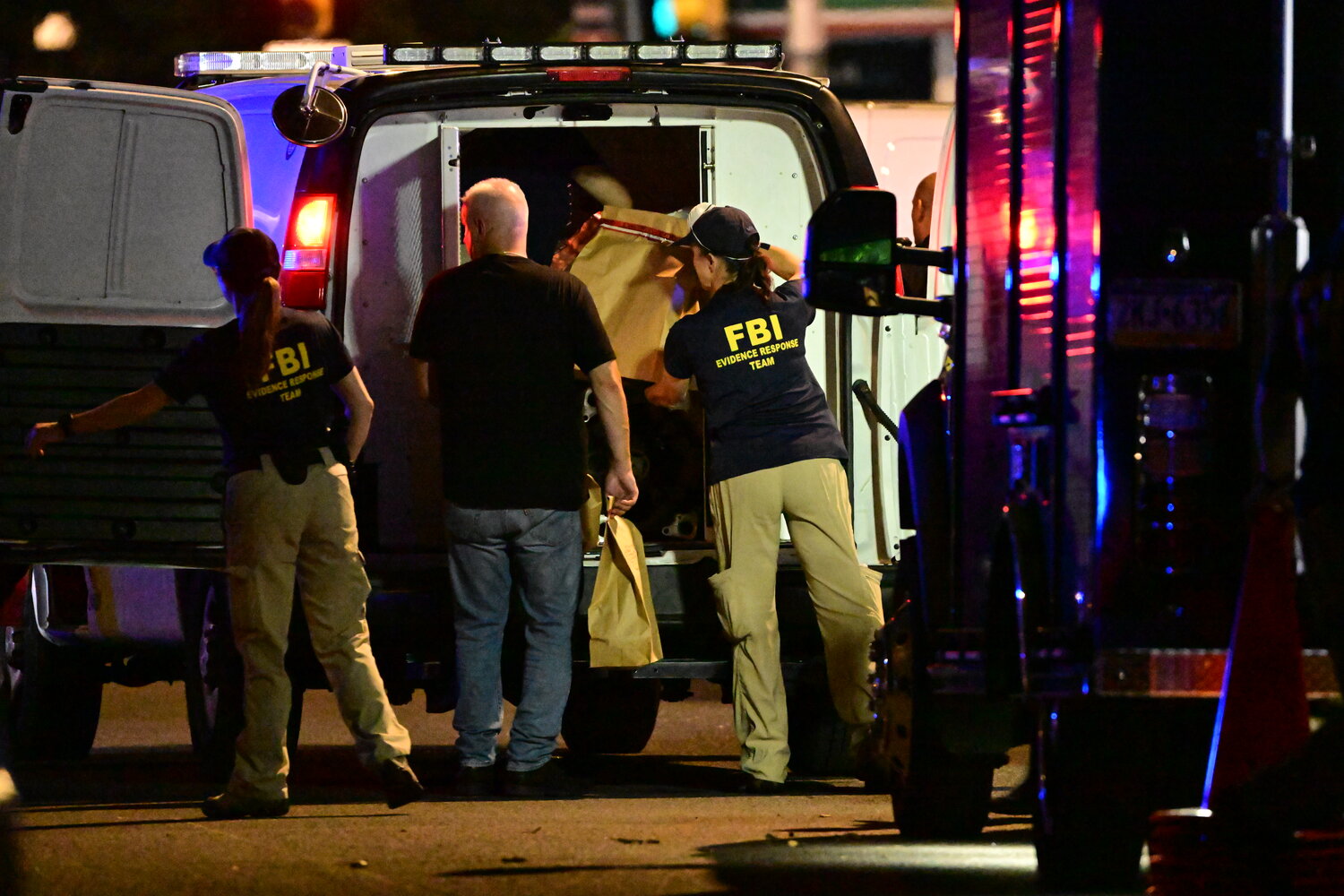 FBI agents from the Evidence Response Team removed over 30 boxes and bags of evidence following the raid of a home on the 400 block of West Chew Avenue in the Olney neighborhood in Philadelphia, Pennsylvania.