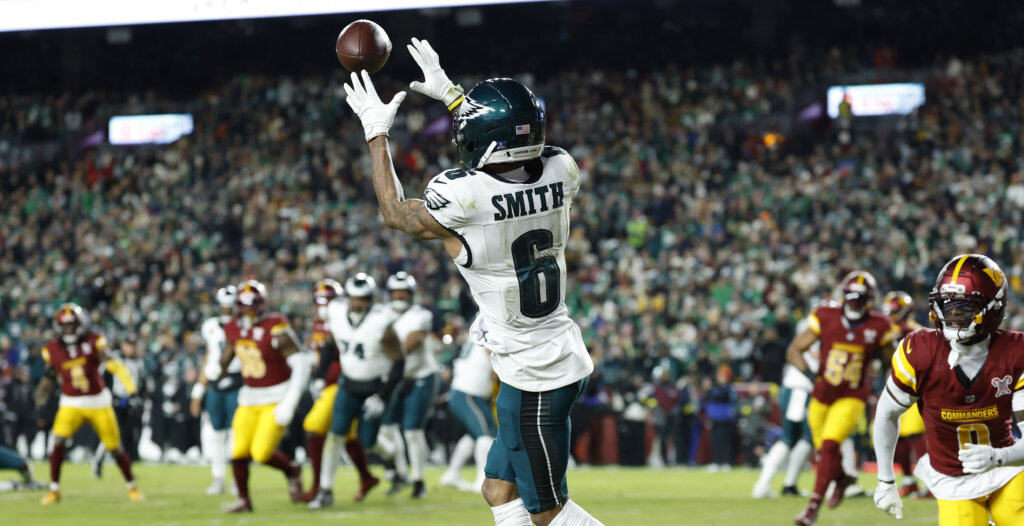 Dec 20, 2025; Landover, Maryland, USA; Philadelphia Eagles wide receiver Devonta Smith (6) makes a catch to score a touchdown against the Washington Commanders in the first half at Northwest Stadium. Mandatory Credit: Geoff Burke-Imagn Images