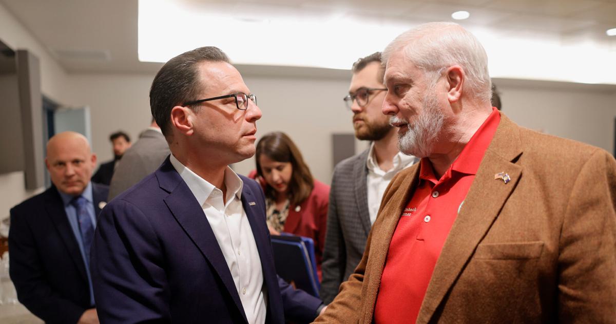 Gov. Josh Shapiro shakes hands with Berks County Commissioner Christian Leinbach. |