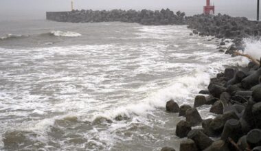 Two tropical storms pound Japan, causing flooding and landslides | Associated Press
