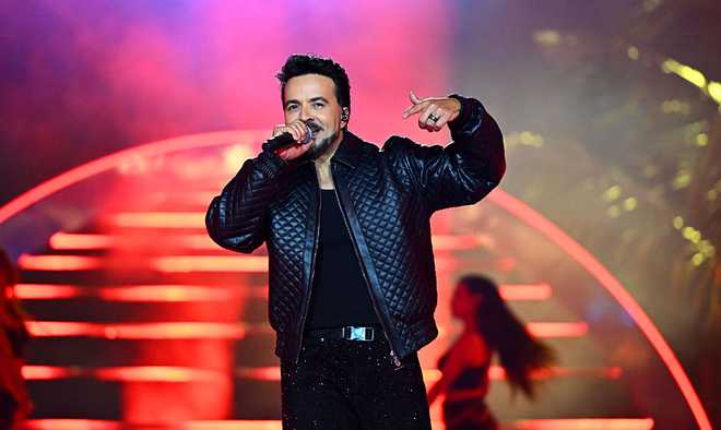 MIAMI, FLORIDA - JANUARY 02: Musical artist Luis Fonsi performs before the 2026 Discover NHL Winter Classic game between the New York Rangers and the Florida Panthers at loanDepot park on January 02, 2026 in Miami, Florida. (Photo by Ben Jackson/NHLI via Getty Images)