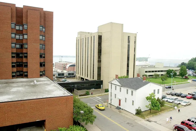 The Dickson Taven, towered over in August 2001 by then-Hamot Hospital and the Hamot Professional Building, was built in 1809 and is thought to be the oldest standing structure in the City of Erie. Erie City Council in late 2001 approved funding or architectural plans to preserve the building.