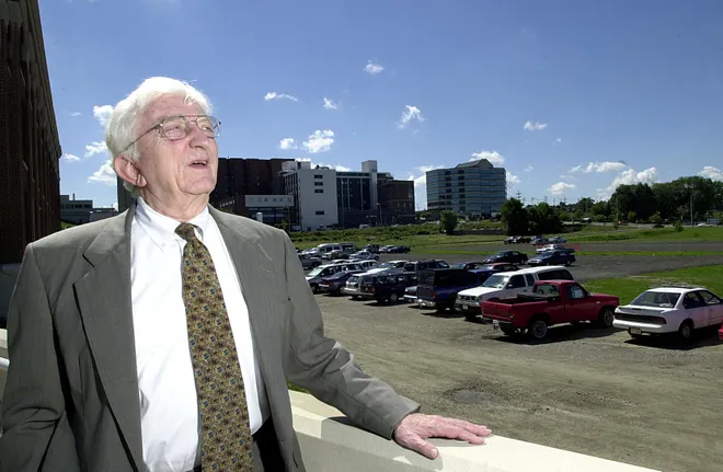 Lead designer Leonard Parker was excited in August 2001 about the prospect of incorporating a new Bayfront Convention Center into Erie's bayfront. The convention center site is behind Parker, show admiring the Bicentennial Tower.