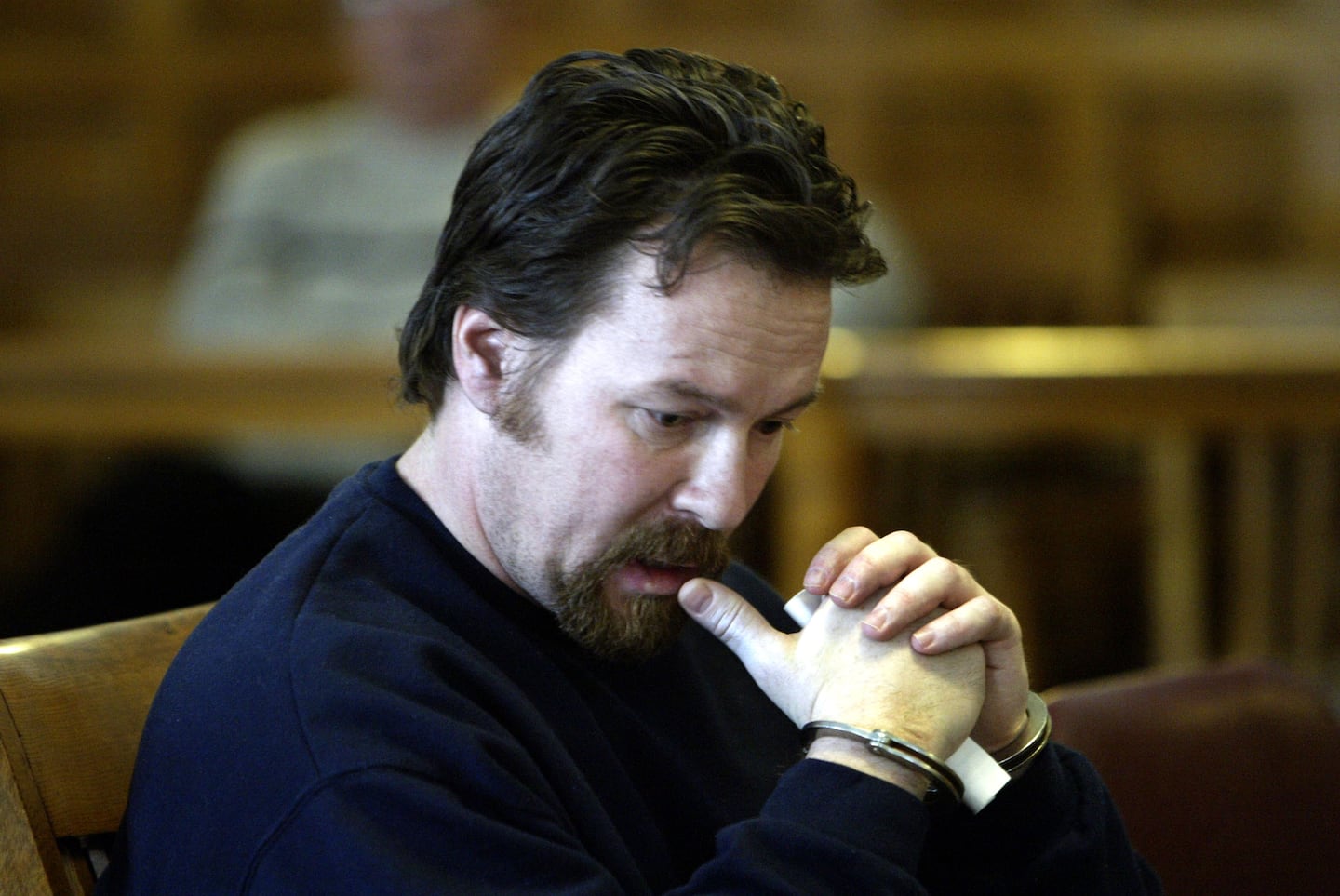 Eugene McCollom waited to take the stand in and plead guilty at Salem Superior Court in 2005.