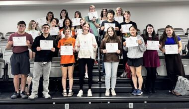 group of students poses for photo