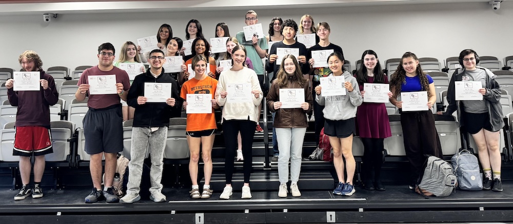 group of students poses for photo
