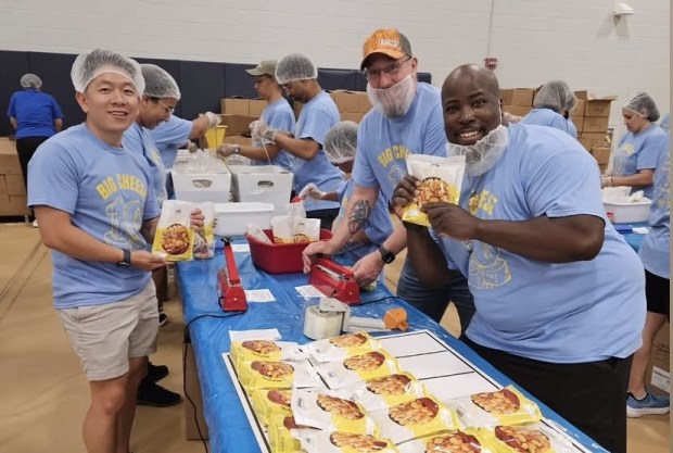 About 500 volunteers gathered at Penn State Berks for United Way of Berks County's 10th annual Big Cheese community food-packing initiative on Friday. The 250,000 macaroni and cheese and apple cinnamon oatmeal meals will be distributed through Helping Harvest Fresh Food Bank and the Reading School District. (Courtesy of United Way of Berks County)