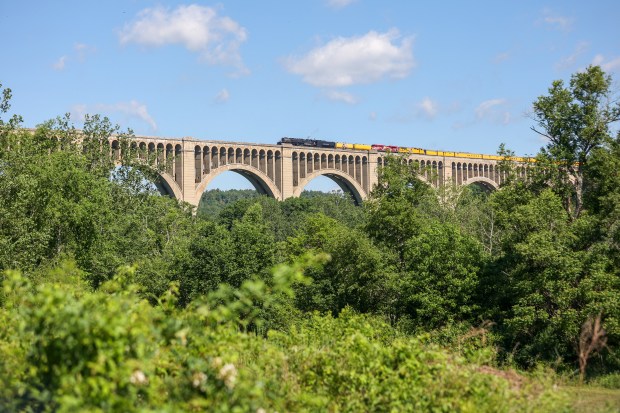 Union Pacific 4014 'Big Boy' crosses the Nicholson Viaduct in Nicholson, Pa. on Saturday, June 13, 2026. (JASON ARDAN / STAFF PHOTOGRAPHER)
