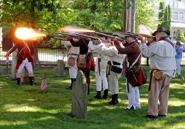 Members of the 24th Connecticut Militia Regiment fire a musket volley during the 'First to Fall' Memorial Service at the Jenkins Harding Cemetery in West Pittston on Sunday, June 29, 2025. The fourth annual service, sponsored by the West Pittston Historical Society, honored Revolutionary War patriots, specifically brothers Benjamin and Stukley Harding who were ambushed in the days before the Battle of Wyoming on June 30, 1778. BILL TARUTIS / CONTRIBUTING PHOTOGRAPHER