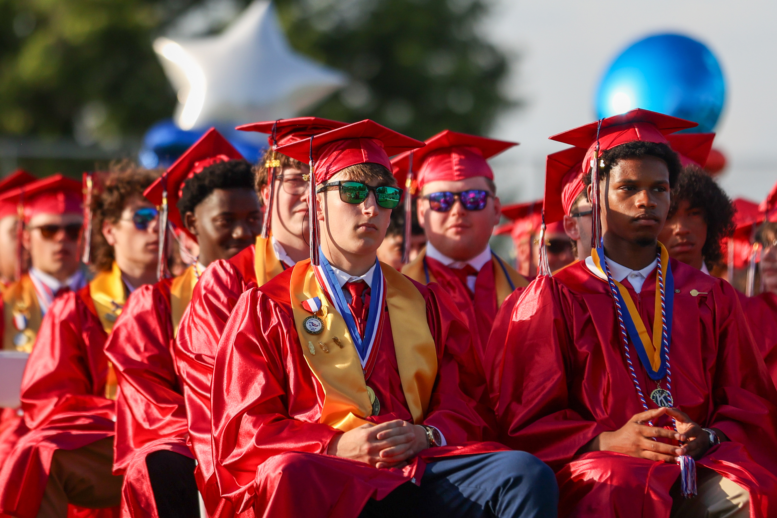 Soon-to-be graduates look on during the 60th annual Pittston Area...