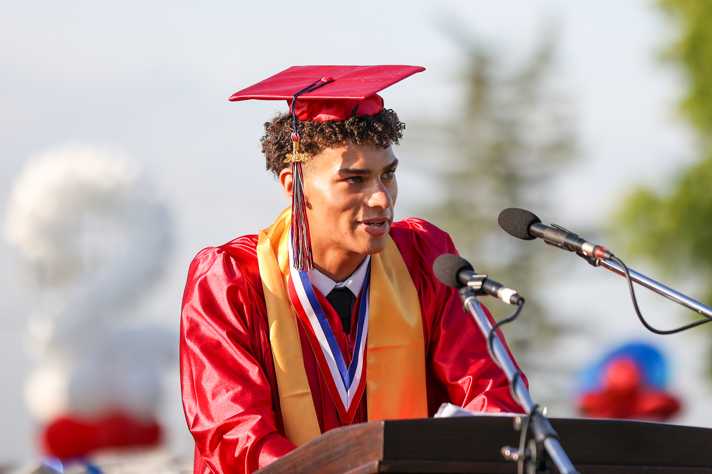 Class president Terry Rogers speaks during the 60th annual Pittston...