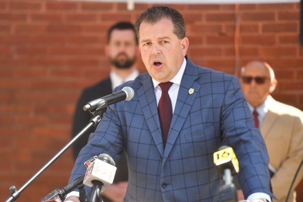 Luzerne County District Attorney Sam Sanguedolce speaks during a press conference held by the U.S. Attorney's Office in front of Wilkes-Barre police headquarters Friday, May 29, 2026. (SEAN MCKEAG / STAFF PHOTOGRAPHER)