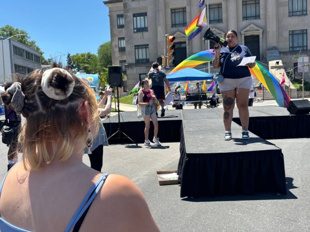 Naiymah Sanchez speaks after the Pride protest and before the start of the Pride Festival Saturday. (KATHLEEN E. CAREY - DAILY TIMES)