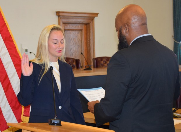Angela Faraglia is sworn in as an Upper Darby police officer by Mayor Ed Brown. (COURTESY OF UPPER DARBY POLICE)