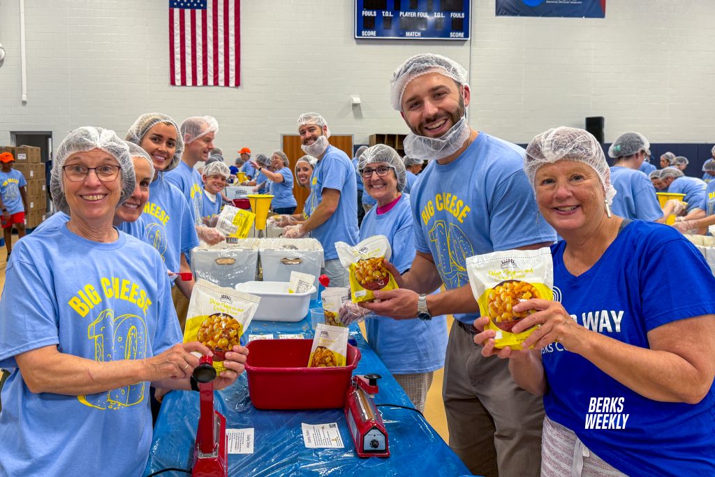 United Way volunteers pack 250K meals during 10th annual Big Cheese event