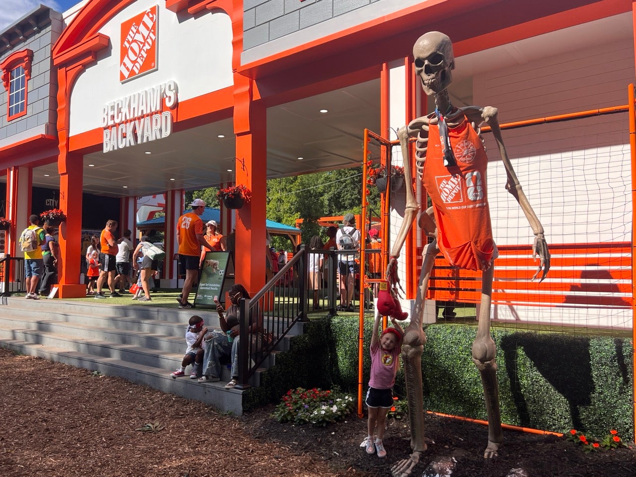 The Home Depot Beckham's Backyard exhibition at the FIFA Fan Festival in Lemon Hill, Philadelphia. Made to look like a backyard with flowers and a large 1- foot tall skeleton wearing a Home Depot apron out in front.