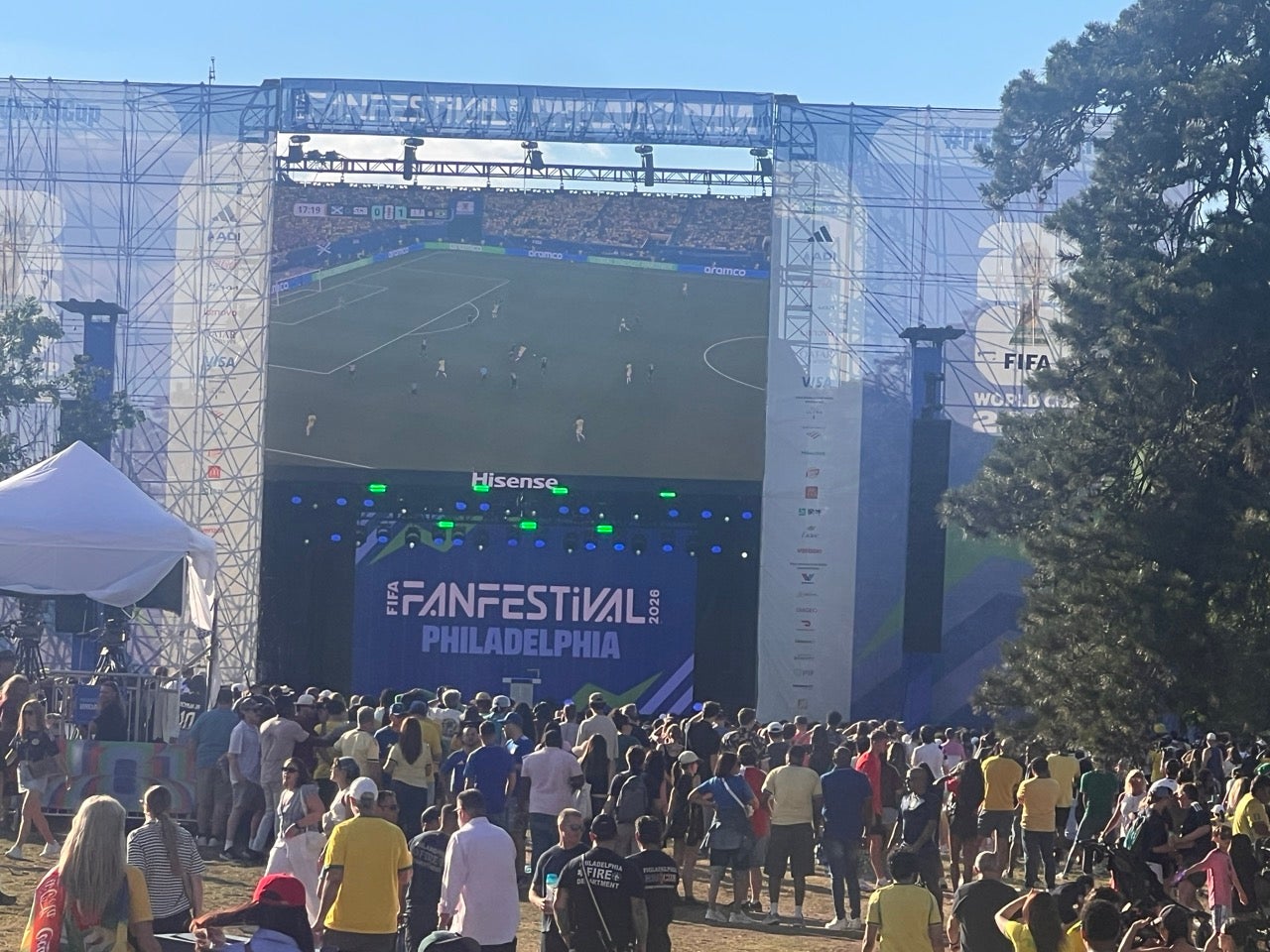 A large crowd gathered in front of the largest viewing screen at the FIFA Fan Festival at Lemon Hill in Philadelphia