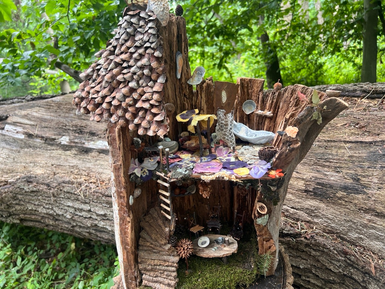 One of the Fairy Houses submitted to the Schuylkill Environmental Center for their Fairytale Trail at the 2nd Annual Philadelphia Fairy Festival. All made of natural materials like wood and leaves. This one has many tiny details, some even made with snake skin.