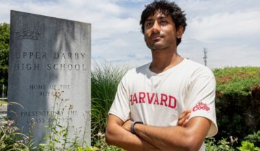 Khandakar Mahin stands for a portrait at Upper Darby High School this month. He is headed to Harvard this fall and hopes to pursue a career in AI ethics and policy.