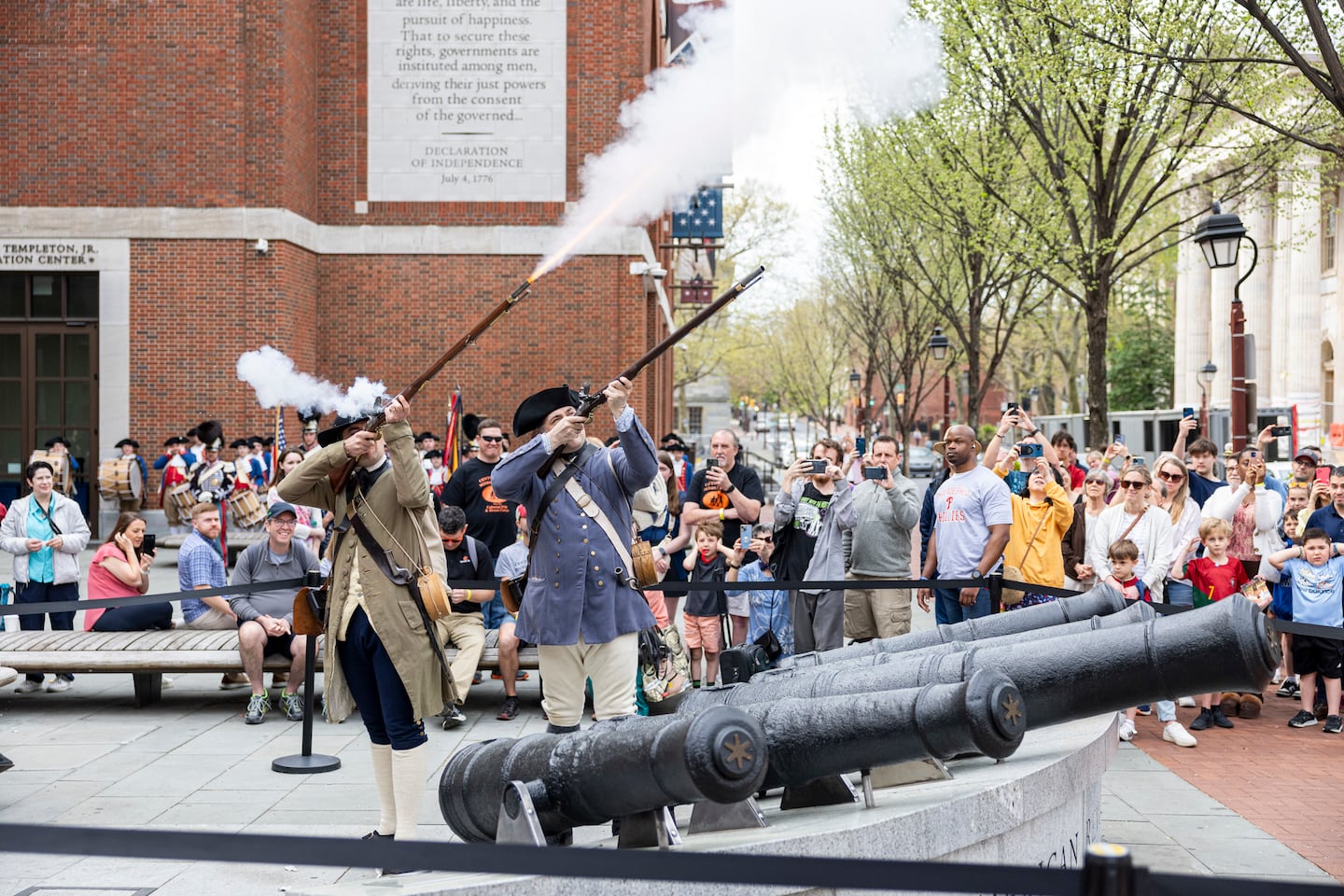 Matthew Skic (left) and Michael Hensinger dressed as Minute Men from the Massachusetts Militia for the opening of the new exhibit Banners of Liberty which showcases the original revolutionary war flags at the Museum of the American Revolution in Philadelphia.
