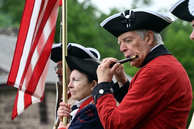 Pete Snow of Allentown plays the fife as part of the Brandywine Colonial Fife and Drum Corps during the Colonial 250th Anniversary Celebration at the Daniel Boone Homestead in Exeter Township on Saturday, June 27, 2026. (BILL UHRICH/READING EAGLE)