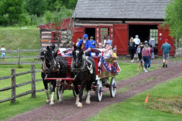 A wagon ride was one of the attractions during the Colonial 250th Anniversary Celebration at the Daniel Boone Homestead in Exeter Township on Saturday, June 27, 2026. (BILL UHRICH/READING EAGLE)